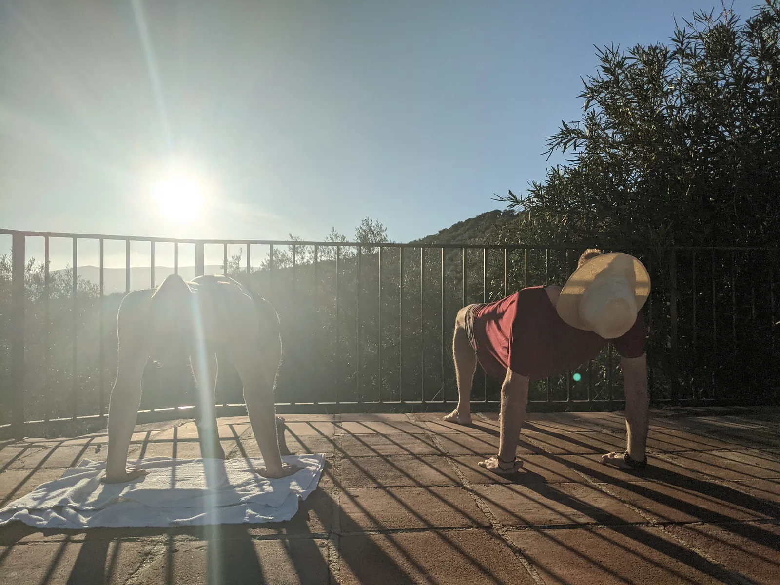 Morning yoga on the terrace at sunrise